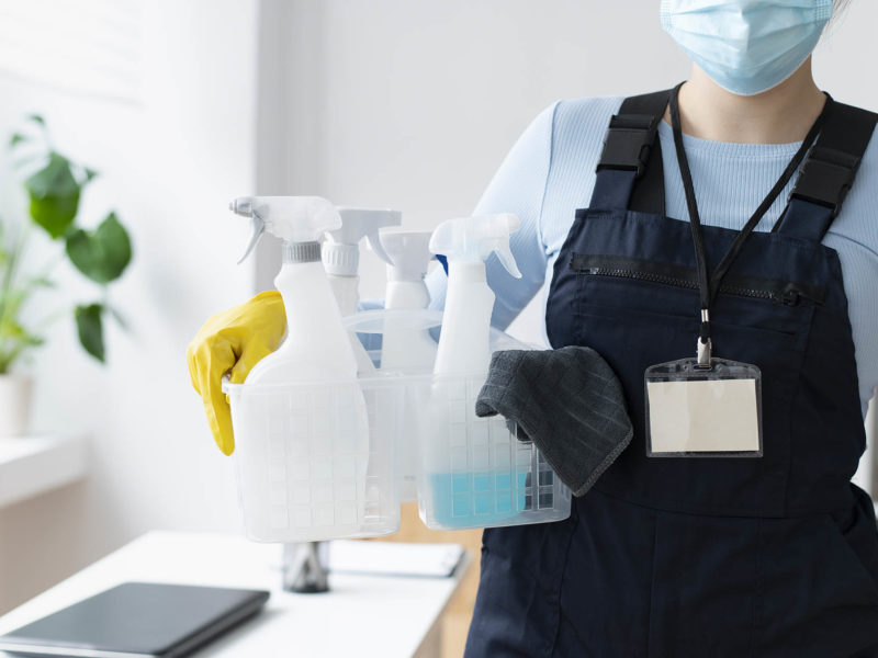 person-taking-care-office-cleaning